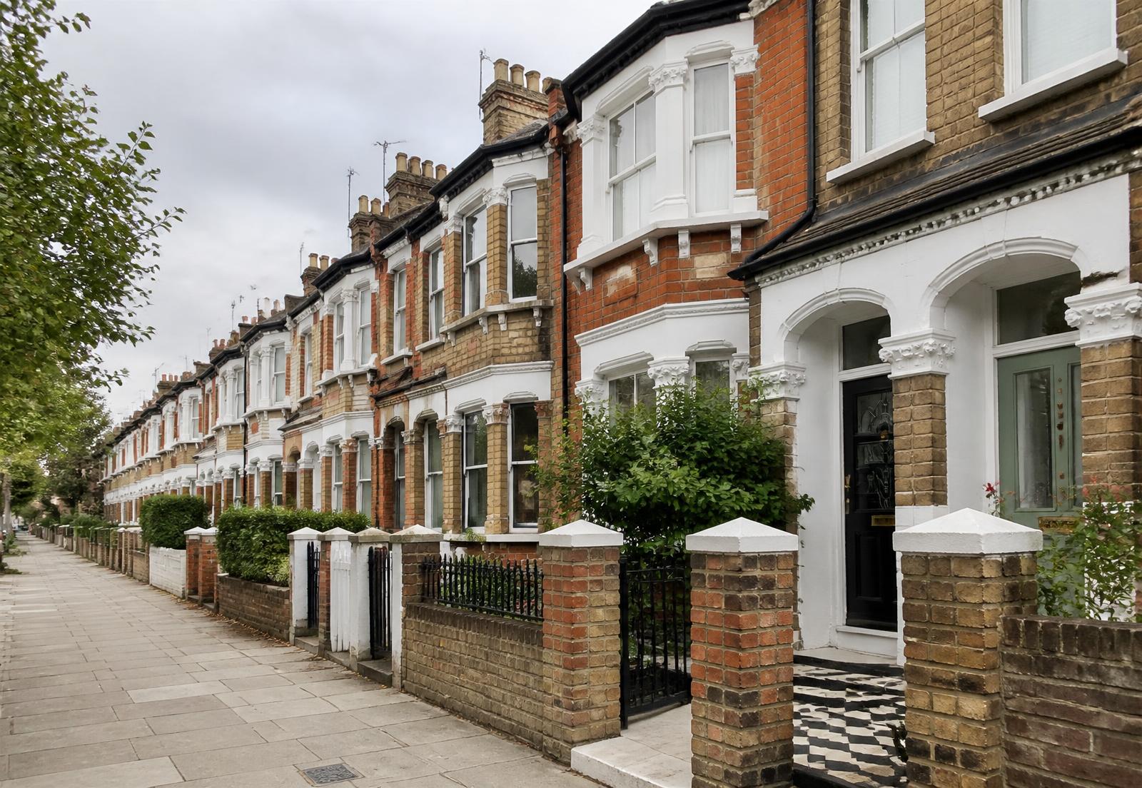 Row of Victorian terraced houses on a typical UK residential street